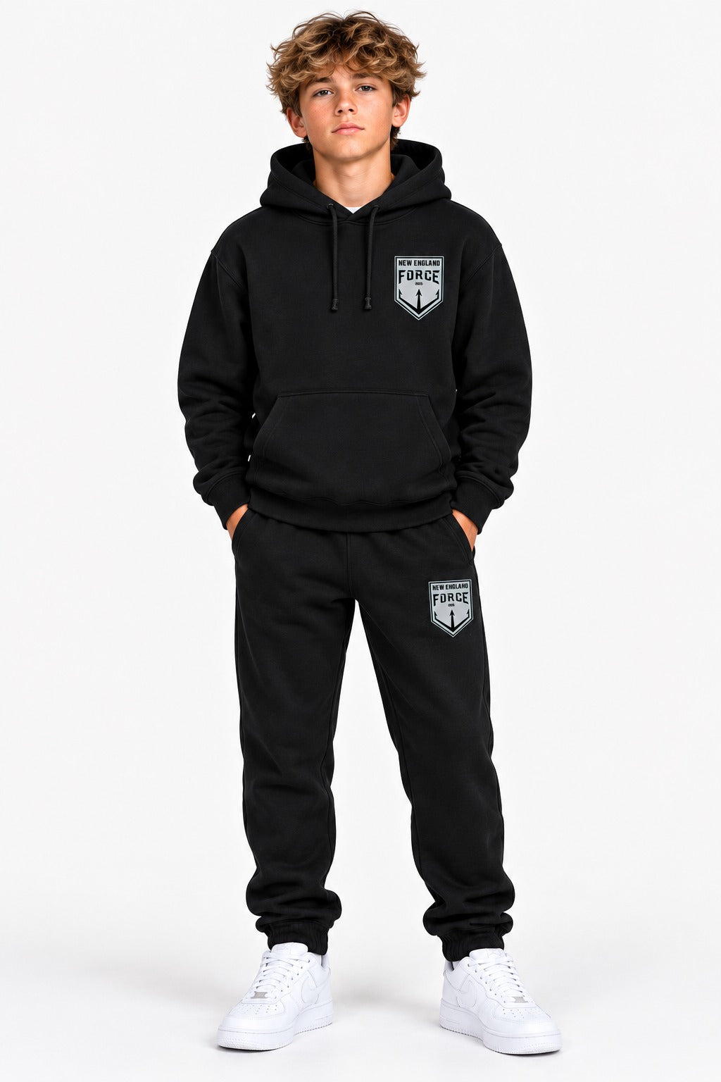 New England Force hoodie and sweatpants set in black with gray crest, worn by a boy