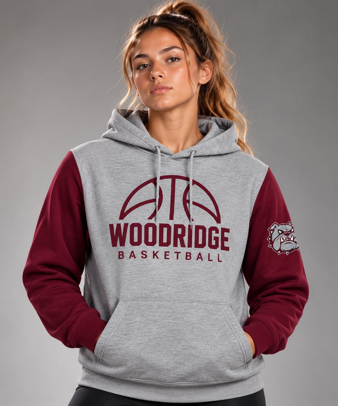 Woodridge Basketball hoodie, heather grey body with maroon sleeves and bulldog sleeve patch